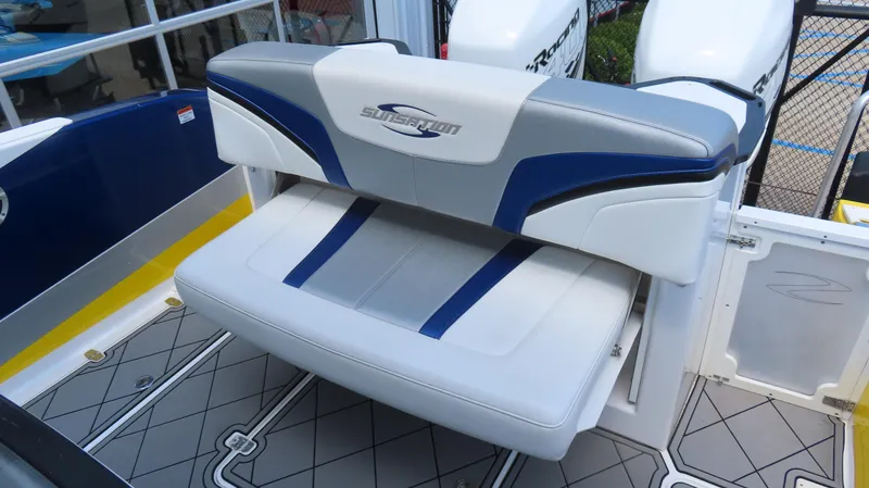 Slide: The Image of 2016 Sunsation 34 CCX boat seat with blue and gray upholstery. - 15