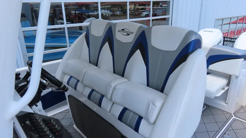 Slide: The Image of 2016 Sunsation 34 CCX boat interior with stylish, cushioned seating and modern design. - 20