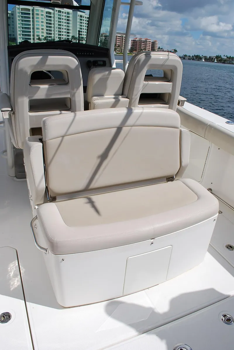 Slide: The Image of 2017 Boston Whaler 330 Outrage boat seating with ocean view and modern design. - 11