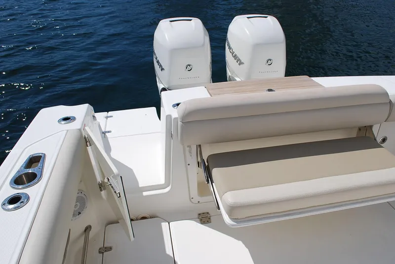 Slide: The Image of 2017 Boston Whaler 330 Outrage boat with dual Mercury engines and comfortable seating. - 26