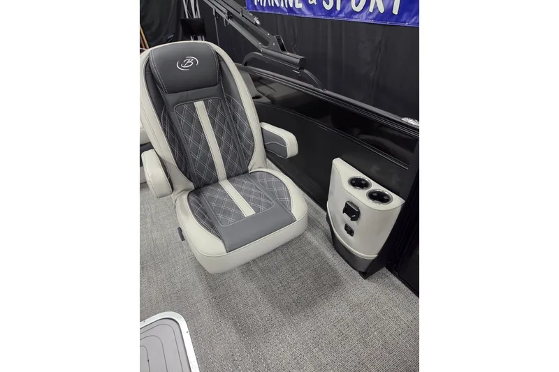 Slide: The Image of Luxurious seating in the 2026 Barletta Lusso 25UC boat, featuring elegant design and cup holders. - 10