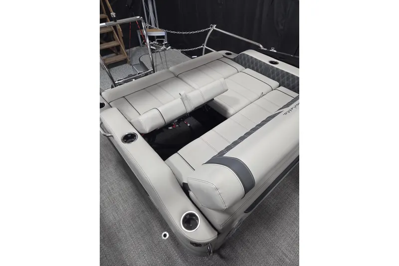 Slide: The Image of 2026 Barletta Lusso 25UC boat interior with luxurious seating and cup holders. - 16