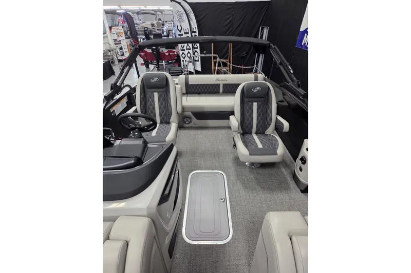 Slide: The Image of Luxurious interior of 2026 Barletta Lusso 25UC pontoon boat, featuring plush seating and modern design. - 9
