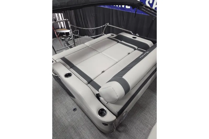 Slide: The Image of 2026 Barletta Corsa 23UC boat interior with luxurious seating and cup holders. - 10