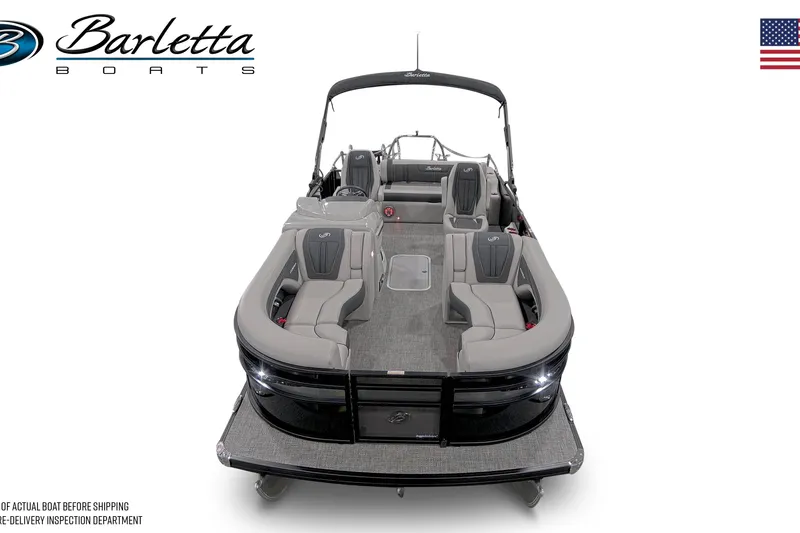 Slide: The Image of 2026 Barletta Corsa 23UC boat interior with steering console and seating. - 6