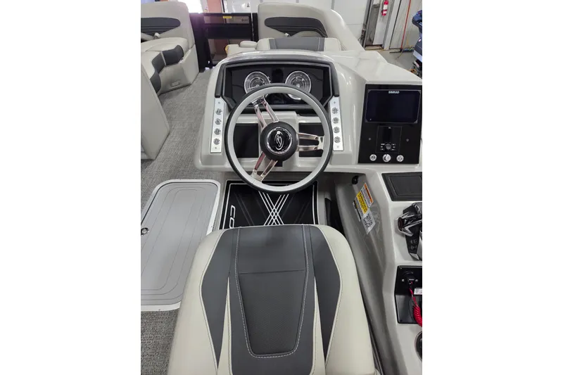 Slide: The Image of Interior of 2026 Barletta Corsa 23UC pontoon boat with seating and table. - 8