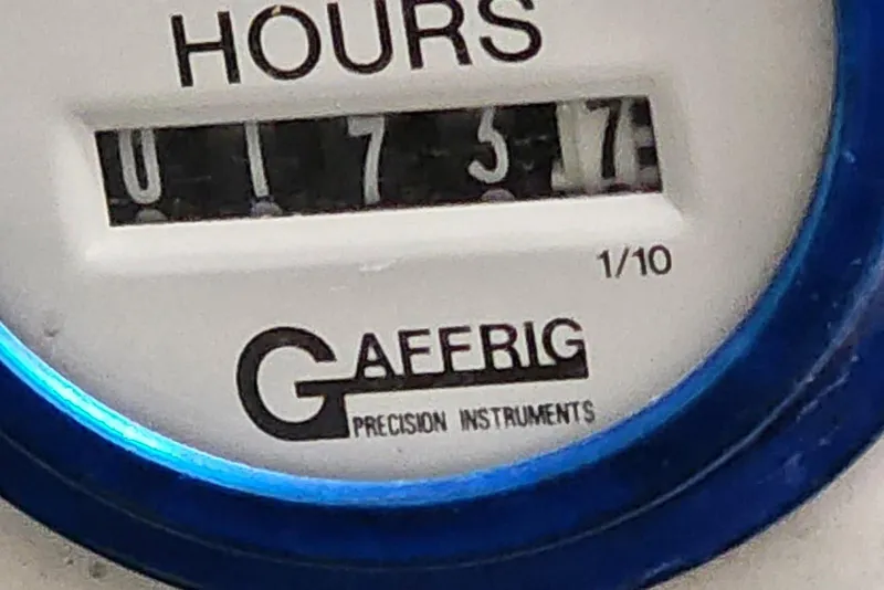 Slide: The Image of Close-up of Gaffrig hour meter reading 175.7 hours, Baja 342, 2001 model. - 12