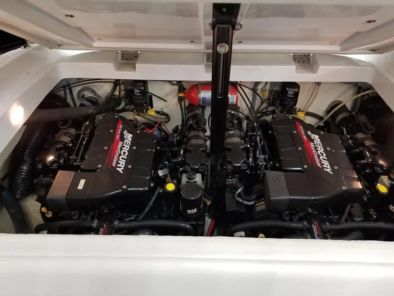 Slide: The Image of 2001 Baja 342 boat engine compartment with dual Mercury engines. - 7