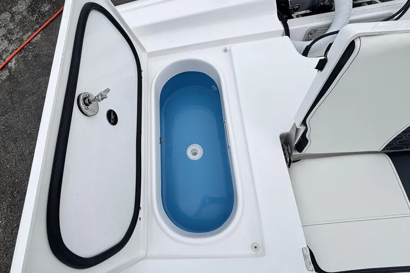 Slide: The Image of Livewell on 2026 Tidewater 2300 Carolina Bay boat, featuring sleek design and functionality. - 14