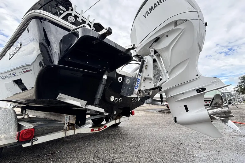 Slide: The Image of 2026 Tidewater 2300 Carolina Bay boat with Yamaha outboard engine on a trailer. - 8