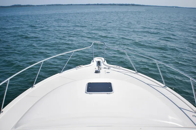 Slide: The Image of Bow view of 2006 Tiara Yachts 3900 Convertible on open water. - 19