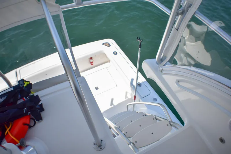 Slide: The Image of 2006 Tiara Yachts 3900 Convertible deck view with safety equipment and railing. - 24