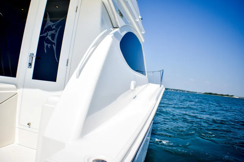 Slide: The Image of 2006 Tiara Yachts 3900 Convertible cruising on blue ocean waters. - 29