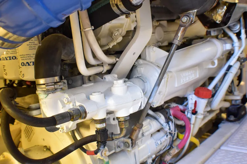 Slide: The Image of Engine compartment of a 2006 Tiara Yachts 3900 Convertible, showcasing detailed mechanical components. - 34
