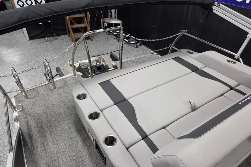 Slide: The Image of 2026 Barletta ARIA 20UC pontoon boat interior with gray seating and stainless steel railings. - 10