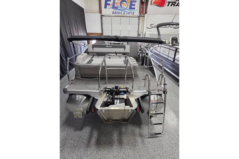 Slide: The Image of 2026 Barletta ARIA 20UC boat interior with gray seating and cup holders. - 11