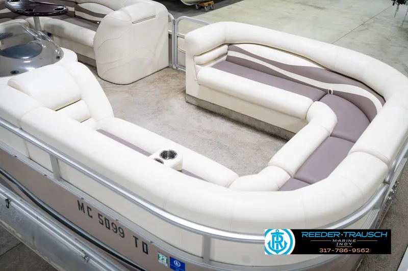Slide: The Image of 2008 Bennington 20 SL pontoon boat with spacious seating and modern interior design. - 13