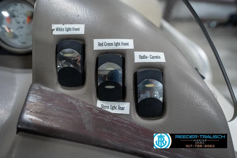 Slide: The Image of Control panel of a 2008 Bennington 20 SL boat with labeled switches. - 31