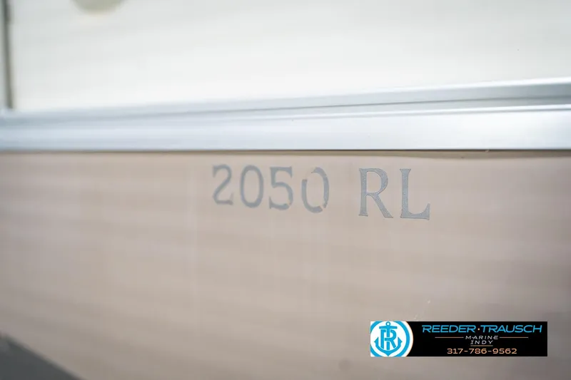 Slide: The Image of 2008 Bennington 20 SL boat with "2050 RL" marking, Reeder-Trausch Marine logo visible. - 42