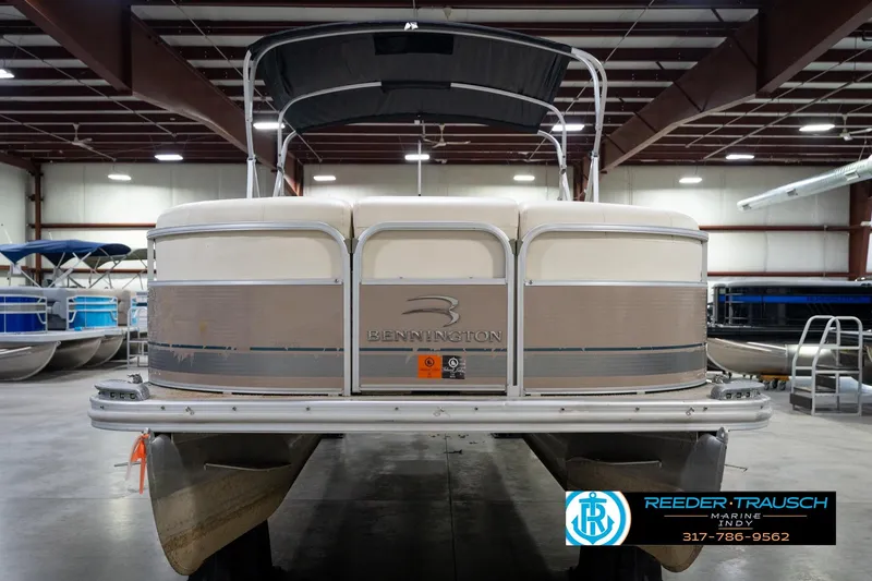 Slide: The Image of 2008 Bennington 20 SL pontoon boat in indoor showroom, front view. - 5