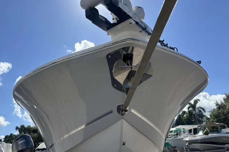 Slide: The Image of 2026 Tidewater 3100 Carolina Bay boat under clear blue sky. - 6