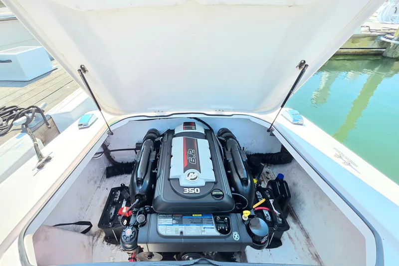 Slide: The Image of Engine compartment of a 2018 Donzi 22 Classic boat with a 6.2L 350 engine. - 18