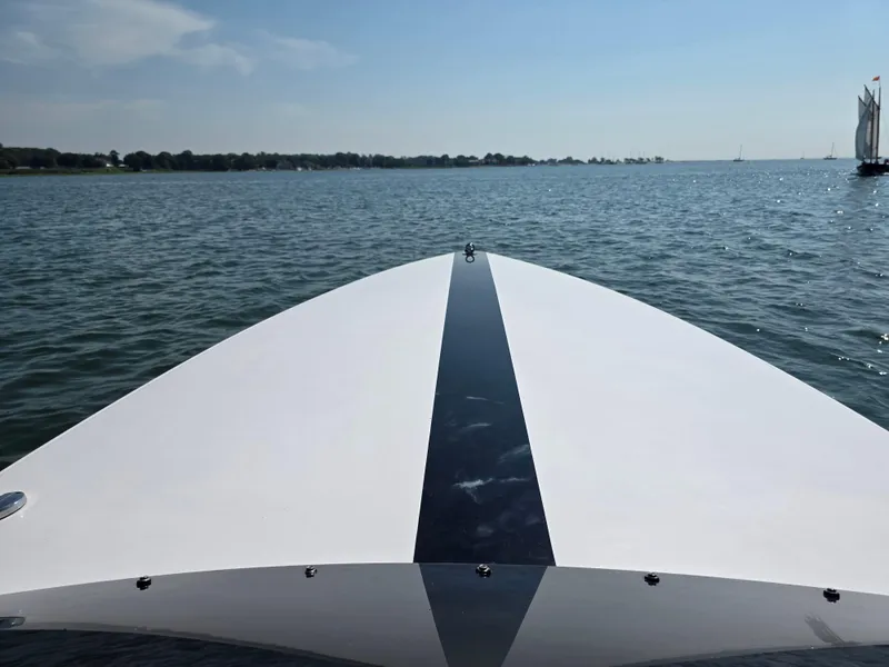 Slide: The Image of Bow view of 2018 Donzi 22 Classic boat on calm water. - 6