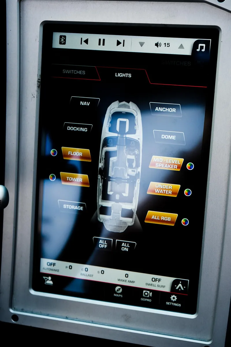 Slide: The Image of Touchscreen control panel in a 2020 Supra SL450 boat, displaying lighting and audio options. - 21