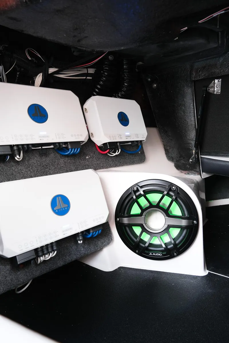 Slide: The Image of 2020 Supra SL450 audio system with amplifiers and illuminated speaker. - 23