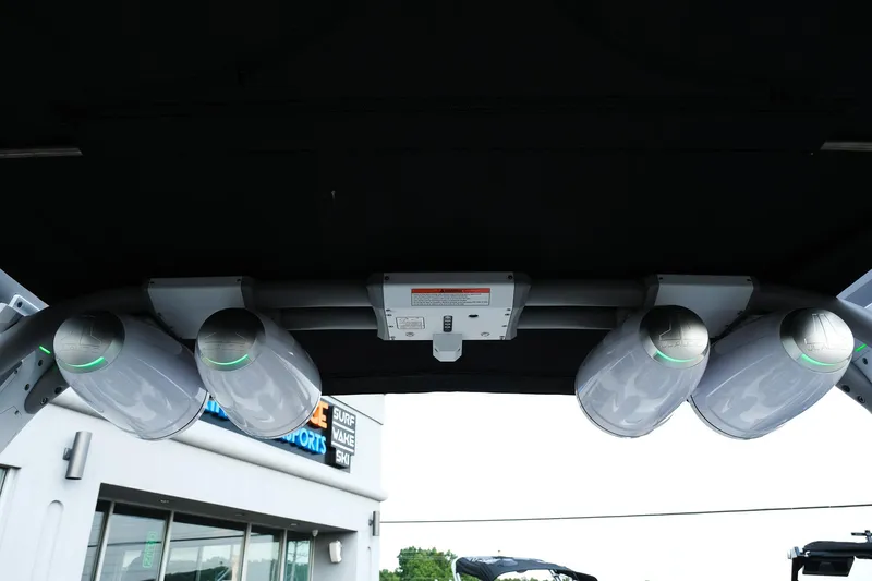 Slide: The Image of 2020 Supra SL450 boat speakers under canopy, showcasing modern audio setup. - 24
