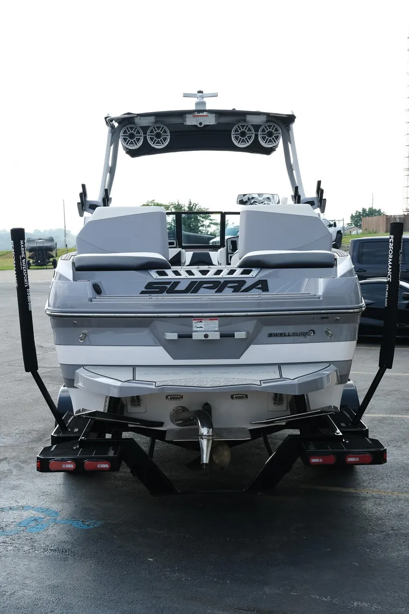 Slide: The Image of 2020 Supra SL450 boat, rear view, featuring sleek design and advanced sound system. - 6