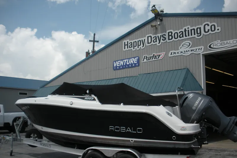 Slide: The Image of 2017 Robalo R227DC boat at Happy Days Boating Co. dealership. - 13