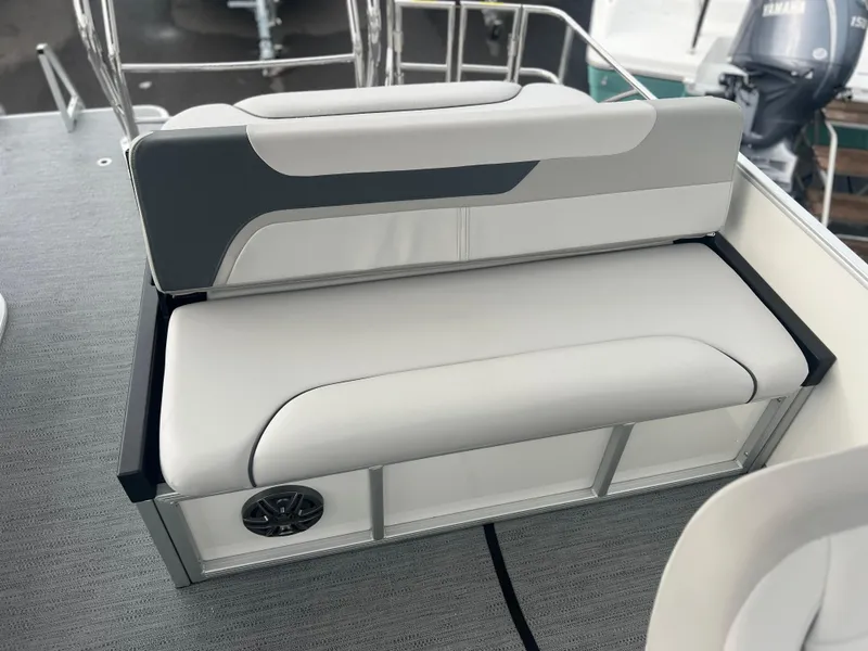 Slide: The Image of 2026 Sweetwater 2286SFLC boat seat with sleek design and integrated speaker. - 6