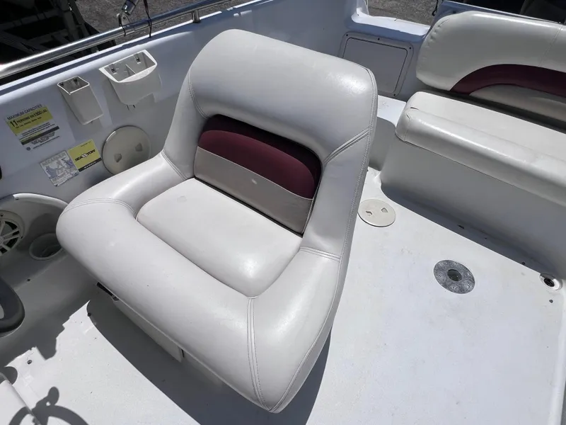 Slide: The Image of White and maroon seating on 2000 Hurricane FunDeck GS 232 OB boat. - 14