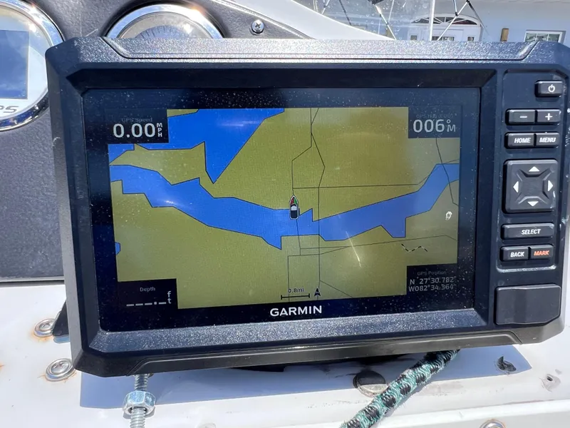 Slide: The Image of Garmin GPS on 2000 Hurricane FunDeck GS 232 OB displaying navigation map. - 15