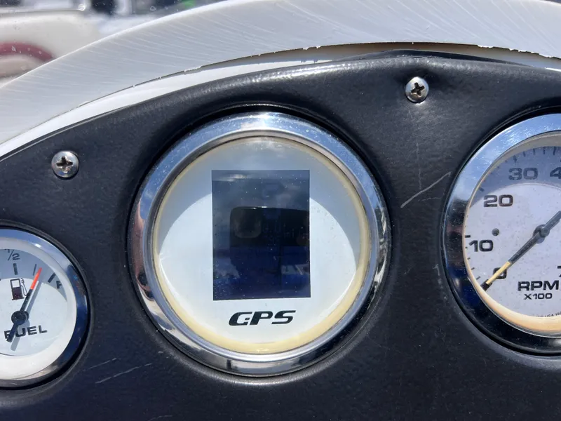 Slide: The Image of Dashboard of 2000 Hurricane FunDeck GS 232 OB with GPS and fuel gauges. - 17