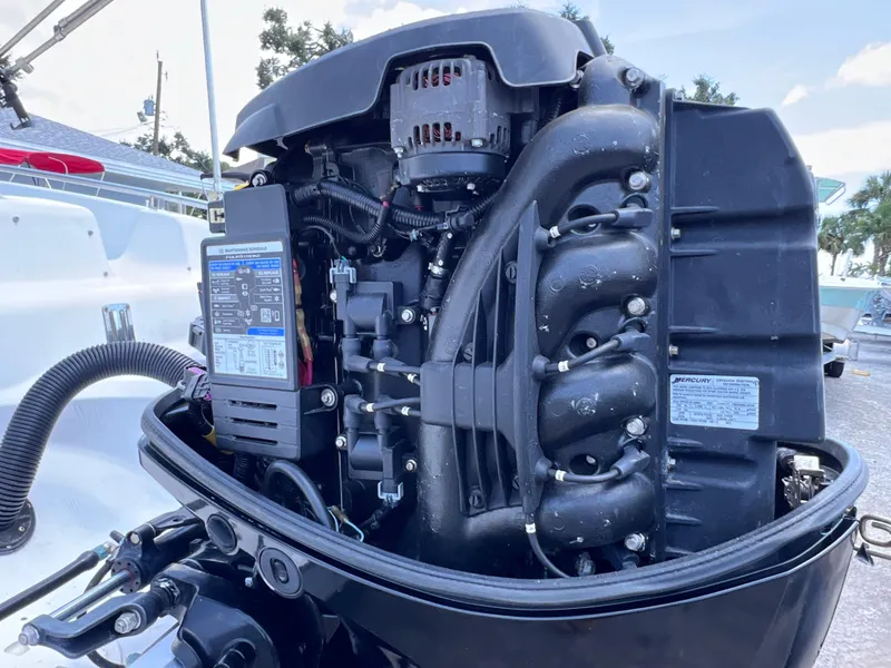 Slide: The Image of Outboard motor of a 2000 Hurricane FunDeck GS 232 OB boat, detailed view. - 23