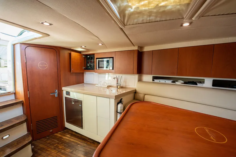 Slide: The Image of Luxurious interior of 2014 Chris-Craft Corsair 36 Hard Top yacht kitchen area. - 43