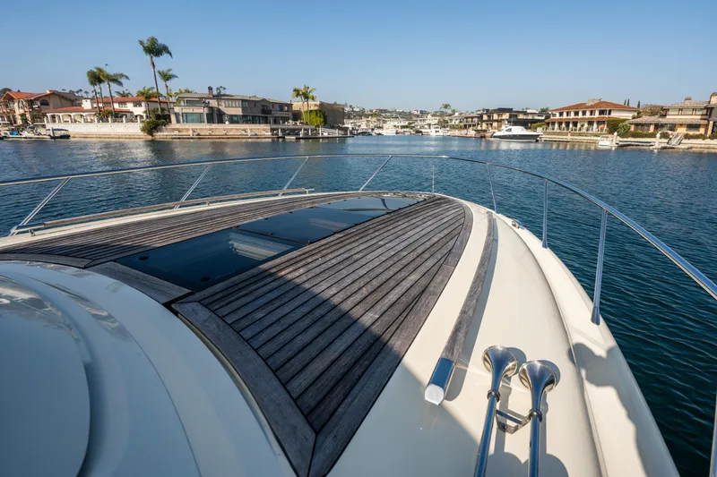 Slide: The Image of 2014 Chris-Craft Corsair 36 Hard Top yacht cruising in a scenic marina. - 34