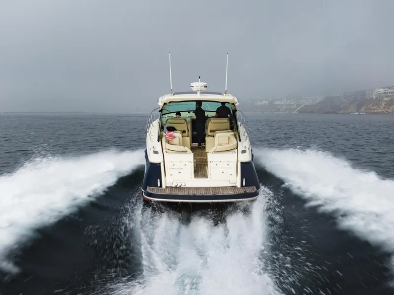 Slide: The Image of 2014 Chris-Craft Corsair 36 Hard Top cruising on open water. - 23
