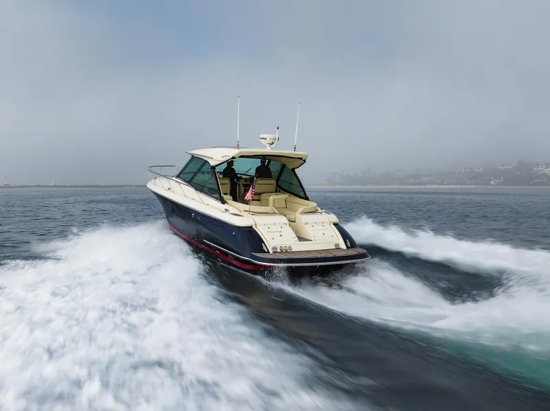 Slide: The Image of 2014 Chris-Craft Corsair 36 Hard Top cruising on open water. - 22