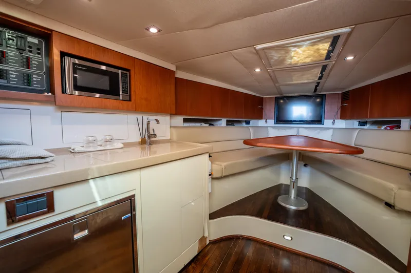 Slide: The Image of Luxurious interior of 2014 Chris-Craft Corsair 36 Hard Top yacht with modern amenities. - 42
