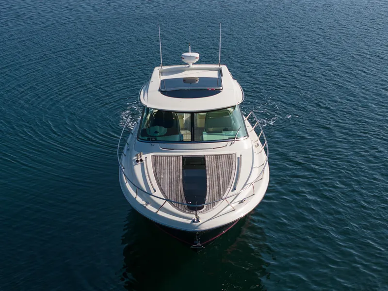 Slide: The Image of 2014 Chris-Craft Corsair 36 Hard Top cruising on calm blue water. - 3