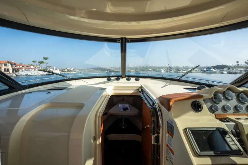 Slide: The Image of Interior view of 2014 Chris-Craft Corsair 36 Hard Top yacht cockpit. - 37
