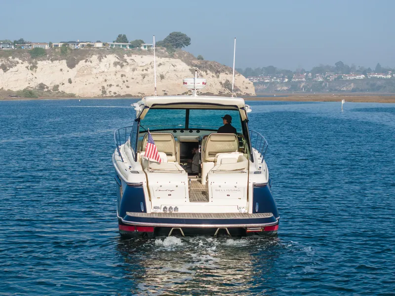 Slide: The Image of 2014 Chris-Craft Corsair 36 Hard Top cruising on scenic coastal waters. - 12