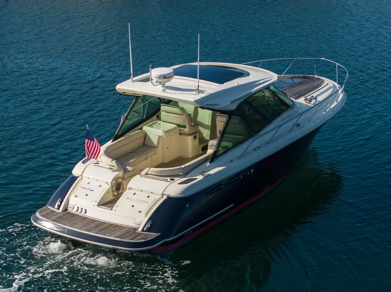 Slide: The Image of 2014 Chris-Craft Corsair 36 Hard Top cruising on calm blue water. - 6