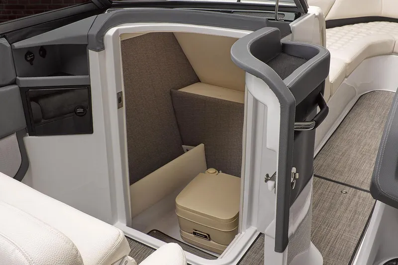 Slide: The Image of Manufacturer Provided Image: 2020 Cobalt R7 Surf boat interior with compact toilet compartment. - 12