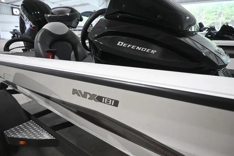Slide: The Image of 2026 Vexus AVX181 DEFENDER boat interior with Mercury engine, showcasing sleek design. - 5
