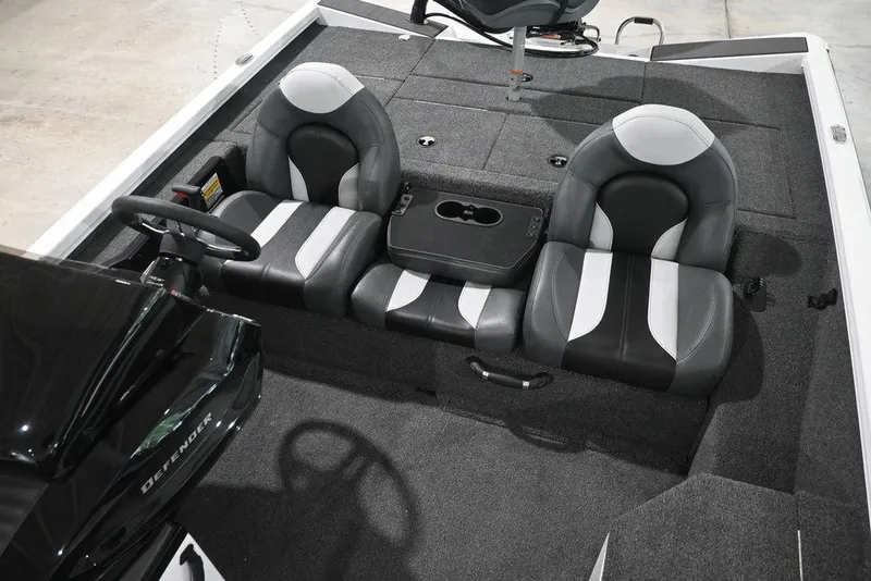 Slide: The Image of 2026 Vexus AVX181 DEFENDER boat interior with dual seats and steering wheel. - 9