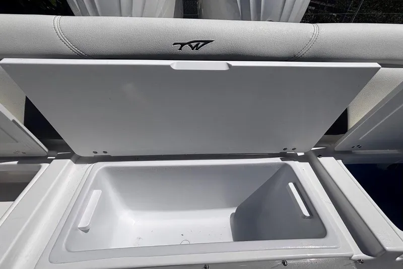 Slide: The Image of Open storage compartment on a 2026 Tidewater 272 LXF boat. - 20